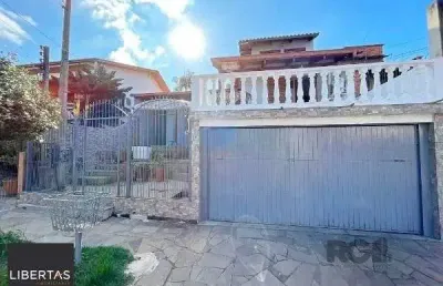 Sobrado em porto alegre, no bairro vila nova, com 3 dormitório(s), e 3 banheiros, à venda.