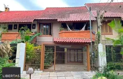 Casa em porto alegre, no bairro guarujá, com 3 dormitório(s), e 3 banheiros, à venda.