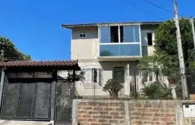 Casa em porto alegre, no bairro vila nova, com 3 dormitório(s), e 3 banheiros, à venda.