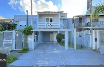 Casa em condomínio fechado com 3 quartos à venda na Rua Felipe Arísio, 96, Hípica, Porto Alegre