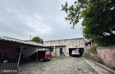Casa com 6 quartos à venda na Rua Upamaroti, 578, Cristal, Porto Alegre