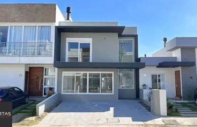 Casa 4 dormitórios( 1 dorm térreo) no condomínio villa amalfi, na zona sul de porto alegre.