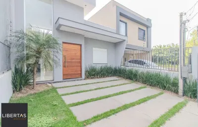 Venda de casa nova com suíte, churrasqueira e garagem