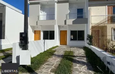 Casa com 3 quartos à venda na Rua Itacyr Rossi, 191, Guarujá, Porto Alegre