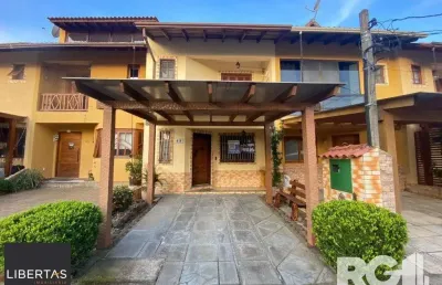 Casa com 3 quartos à venda na Avenida Edgar Pires de Castro, 1286, Hípica, Porto Alegre