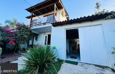 Casa com 2 quartos à venda na Rua Paulo Rubilar de Farias, 140, Restinga, Porto Alegre