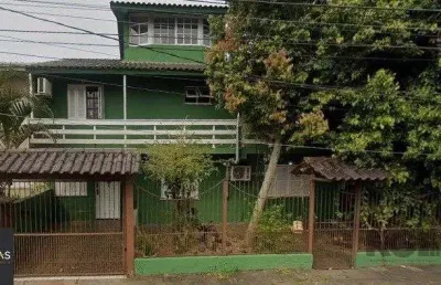 Casa com 4 quartos à venda na Rua Vinte e Um de Agosto, 183, Cavalhada, Porto Alegre