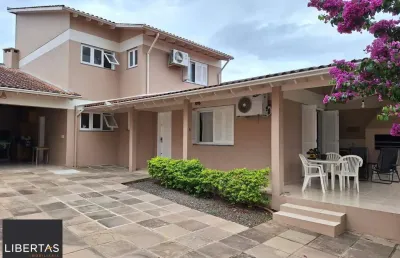 Casa com 3 quartos à venda na Rua César de Castro, 163, Teresópolis, Porto Alegre