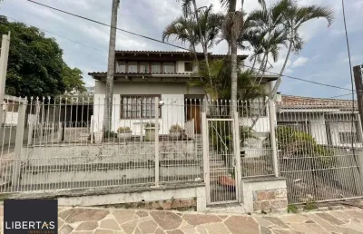 Casa com 6 quartos à venda na Rua João Bonuma, 120, Partenon, Porto Alegre