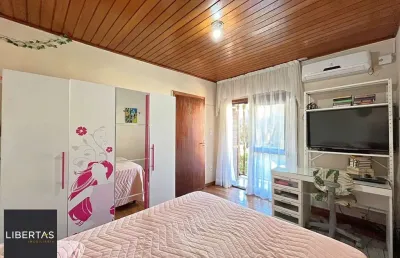 Casa com 4 quartos à venda na Rua Xavier da Cunha, 507, Cristal, Porto Alegre