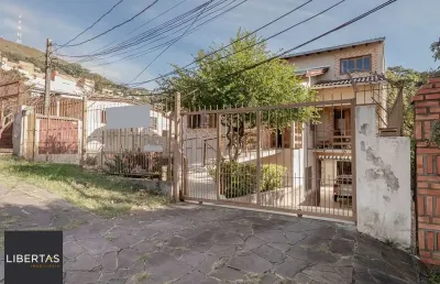 Casa com 5 quartos à venda na Rua Patrimonio, 119, Glória, Porto Alegre