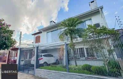Casa com 4 quartos à venda na Rua Pedro Waine, 194, Santa Maria Goretti, Porto Alegre