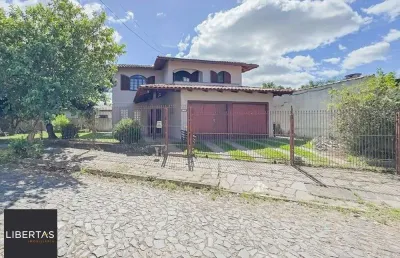 Casa com 5 quartos à venda na Rua Vicente Celestino, 430, Parque Dos Maias, Porto Alegre
