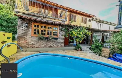 Casa em condomínio fechado com 4 quartos à venda na Das Figueiras, 108, Santa Tereza, Porto Alegre