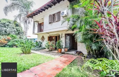 Casa em condomínio fechado com 4 quartos à venda na Acesso das Orquídeas, 93, Santa Tereza, Porto Alegre