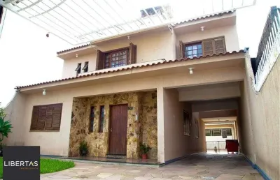 Casa com 3 quartos à venda na Rua Princesa Isabel, 735, Sumaré, Alvorada