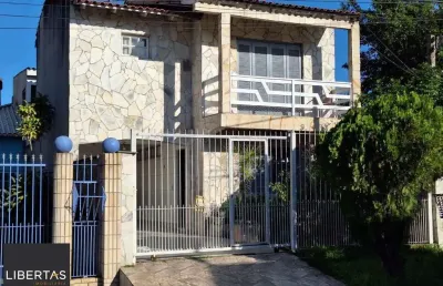 Casa com 3 quartos à venda na Rua Integração, 52, Jardim Algarve, Alvorada