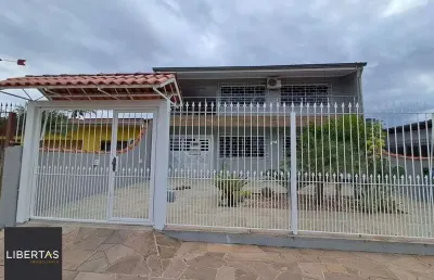 Casa com 3 quartos à venda na Rua Gaspar Martins, 894, Americana, Alvorada