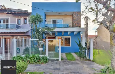 Casa com 3 quartos à venda na Rua Guatambu, 271, Hípica, Porto Alegre