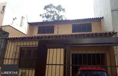 Casa sobrado no bairro auxiliadora de 3 dormitórios e 3 vagas