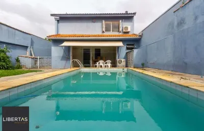 Casa de 4 dormitórios à venda no bairro ipanema - porto alegre
