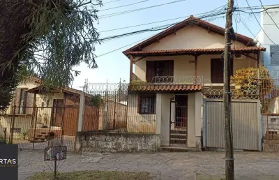 Casa com 3 quartos à venda na Avenida Doutor Petrônio Portella, 1415, Parque Santa Fé, Porto Alegre