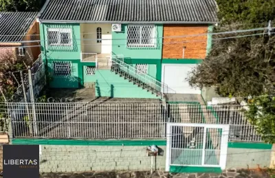 Casa em condomínio fechado com 4 quartos à venda na Rua Álvaro Osimo Caetano, 106, Santa Tereza, Porto Alegre