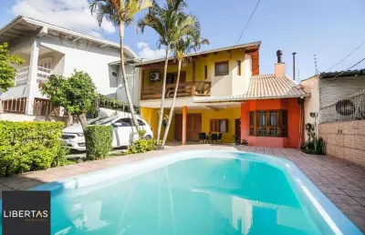 Casa de 4 dormitórios à venda no bairro rubem berta, porto alegre.