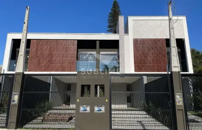 Sobrado geminado no bairro anita garibaldi com suíte