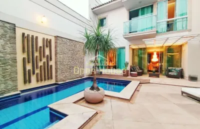 Magnífica casa com 4 suítes, piscina, sauna e jacuzzi, à venda no bairro jardim normandia, em volta