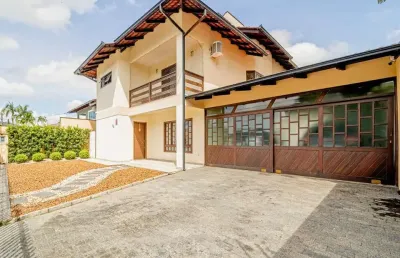 Casa com 4 quartos à venda na rua assis brasil, 92, saguaçu, joinville por r$ 1.350.000