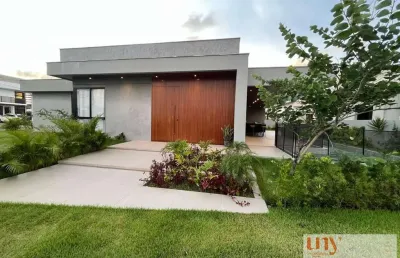 Casa luxuosa com 4 suítes e área de lazer privativa em condomínio fechado no bairro de intermares