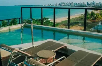 Flat novo pé na areia com 18,94 m² na beira mar do jardim oceania