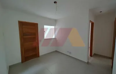 Apartamento para venda de 2 dormitórios, sala, cozinha, banheiro e lavanderia com armários.