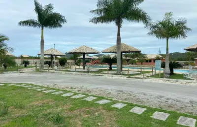 Terreno com 502 m² com testada de 25 m² condomínio em manguinhos