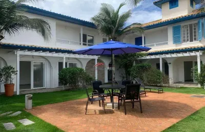 Flat com 1 suíte, vista para o jardim em condomínio frente-mar.
