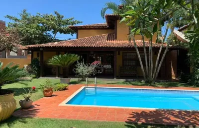 Manguinhos a poucos metros da praia , com 4 quartos e dependencia.