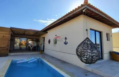 Casa com 04 suítes e piscina na beira do canal marina búzios
