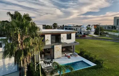 Casa em condomínio fechado com 5 quartos à venda no Centro, Xangri-Lá 