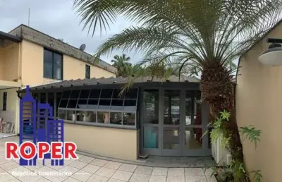 Linda casa de alto padrão com 480 m² área construída à venda no centro de ubatuba.