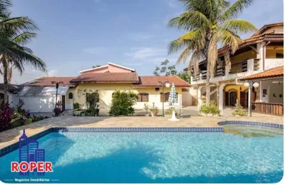 Linda casa de alto padrão/ piscina/ área gourmet à venda em são lourenço, bertioga