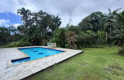Casa com 3 quartos, piscina e área gourmet com churrasqueira em itanhaém.