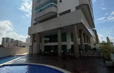 Apartamento à 50m do mar com piscina e 2 quartos em praia grande.