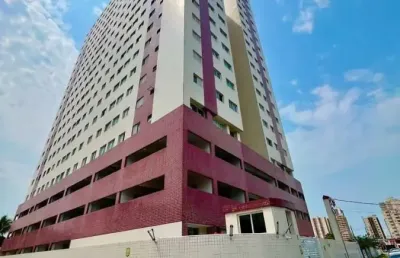 Apartamento à 800m do mar com churrasqueira em praia grande.