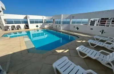 Apartamento à 30m do mar com piscina em praia grande.