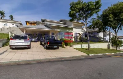 Venda de sobrado de alto padrão em condomínio no jardim cerejeiras, arujá-sp: 4 quartos, 2 suítes, 2 salas, 5 banheiros, 2 vagas de garagem, 360m².