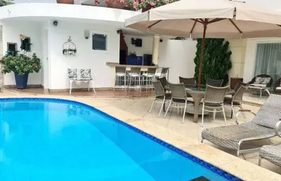 Casa em condomínio fechado com 5 quartos à venda na Avenida Praia de Itapoan, Vilas do Atlantico, Lauro de Freitas