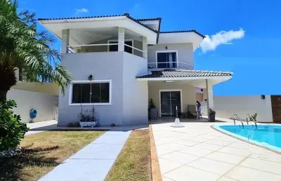 Casa em condomínio fechado com 4 quartos à venda na Avenida Praia de Itapoan, 101, Busca-Vida, Camaçari