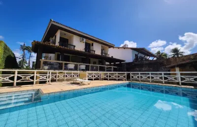 Casa em condomínio fechado com 4 quartos à venda na Avenida Praia de Itapoan, 9, Vilas do Atlantico, Lauro de Freitas