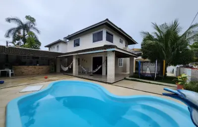 Casa em condomínio fechado com 4 quartos à venda na Avenida Praia de Itapoan, 9, Buraquinho, Lauro de Freitas